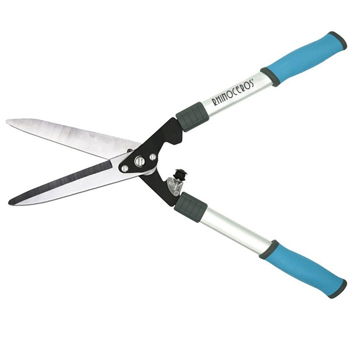 Het gebruik van tuingereedschap - hoge takkenscharen en hoge takzagen